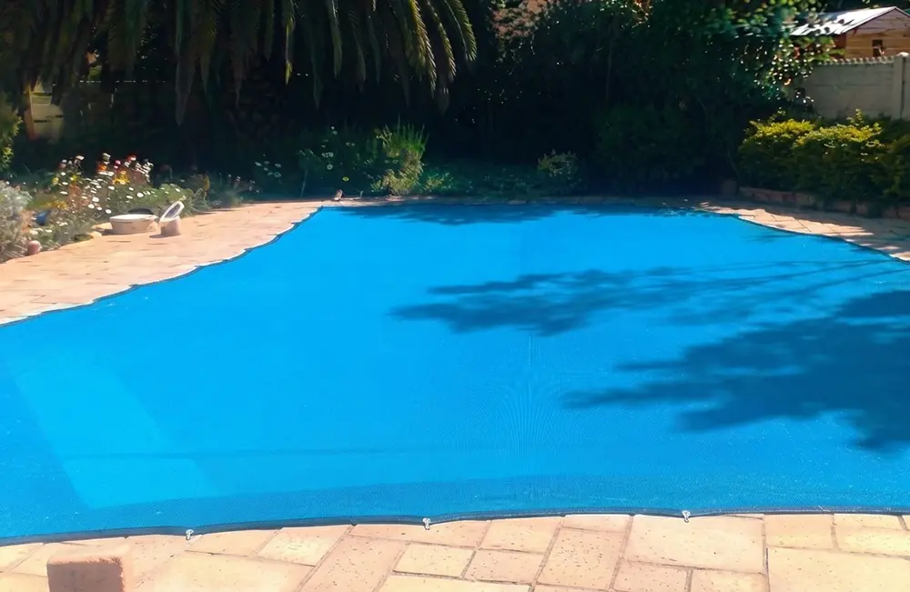 Pool leaf net professionally fitted over a residential swimming pool