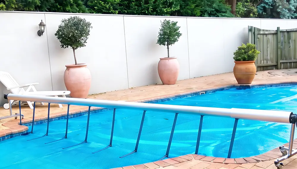 Pool cover reel system for larger swimming pools